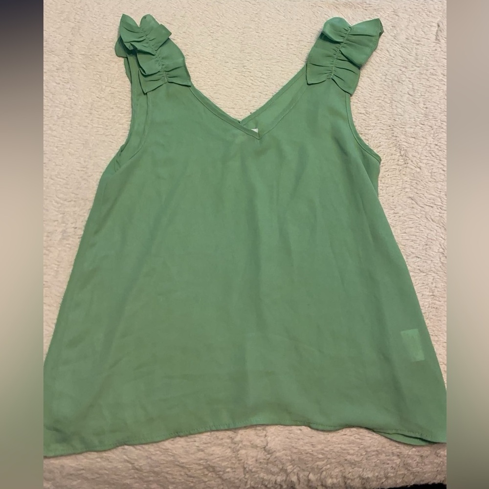green tank top